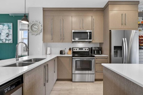 4 Cornerstone Manor Ne, Calgary, AB - Indoor Photo Showing Kitchen With Stainless Steel Kitchen With Double Sink With Upgraded Kitchen