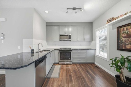 43 Sage Bluff Circle Nw, Calgary, AB - Indoor Photo Showing Kitchen With Upgraded Kitchen