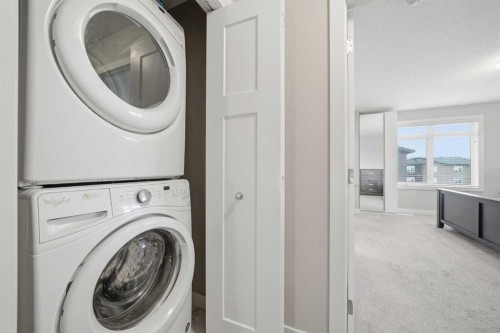 43 Sage Bluff Circle Nw, Calgary, AB - Indoor Photo Showing Laundry Room