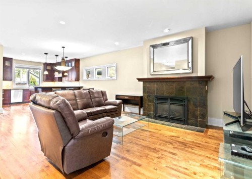 1428 2A Street Nw, Calgary, AB - Indoor Photo Showing Living Room With Fireplace