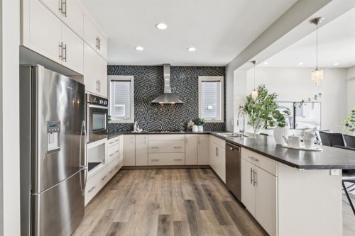 63 Copperstone Drive Se, Calgary, AB - Indoor Photo Showing Kitchen With Upgraded Kitchen