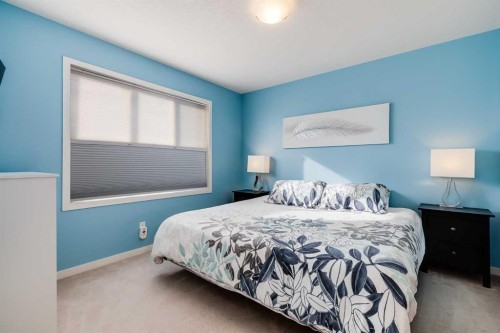 20 Copperpond Rise Se, Calgary, AB - Indoor Photo Showing Bedroom
