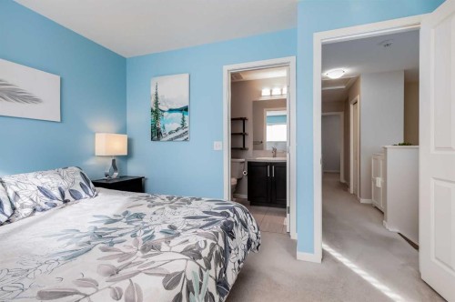 20 Copperpond Rise Se, Calgary, AB - Indoor Photo Showing Bedroom