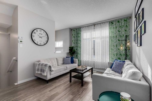 20 Copperpond Rise Se, Calgary, AB - Indoor Photo Showing Living Room