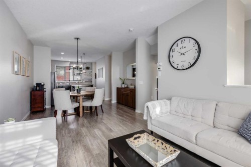 20 Copperpond Rise Se, Calgary, AB - Indoor Photo Showing Living Room