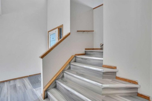 17 Taracove Crescent Ne, Calgary, AB - Indoor Photo Showing Other Room