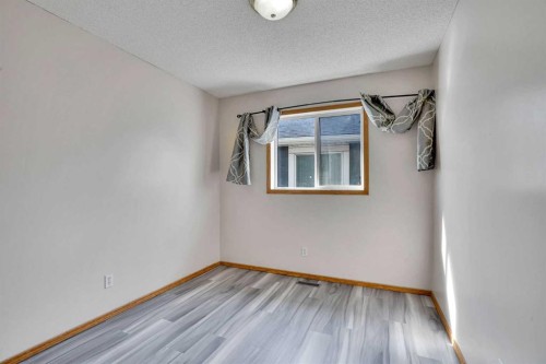 17 Taracove Crescent Ne, Calgary, AB - Indoor Photo Showing Other Room