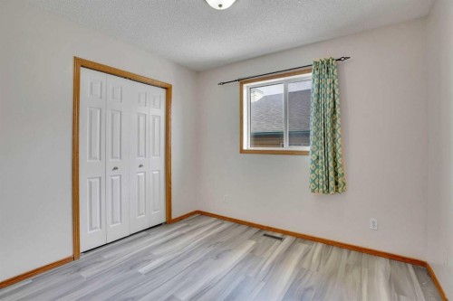 17 Taracove Crescent Ne, Calgary, AB - Indoor Photo Showing Other Room
