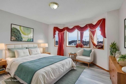 17 Taracove Crescent Ne, Calgary, AB - Indoor Photo Showing Bedroom