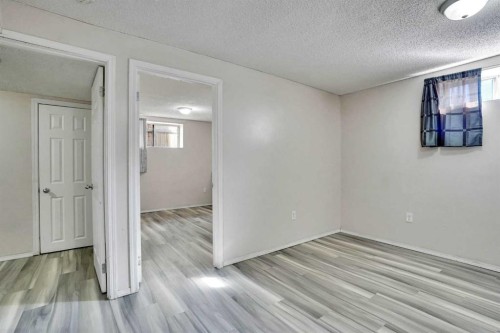 17 Taracove Crescent Ne, Calgary, AB - Indoor Photo Showing Other Room