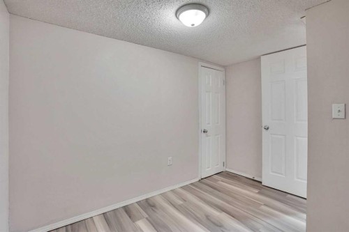 17 Taracove Crescent Ne, Calgary, AB - Indoor Photo Showing Other Room