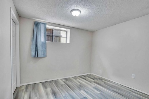 17 Taracove Crescent Ne, Calgary, AB - Indoor Photo Showing Other Room