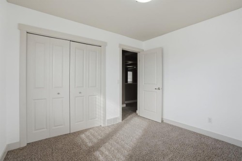 595 Panamount Boulevard Nw, Calgary, AB - Indoor Photo Showing Other Room