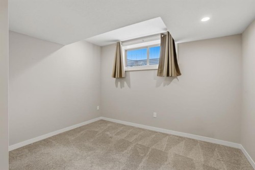 595 Panamount Boulevard Nw, Calgary, AB - Indoor Photo Showing Other Room