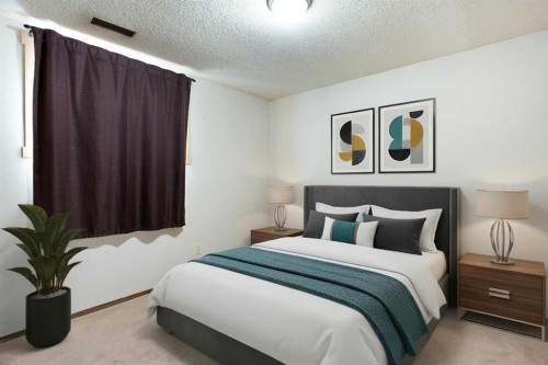 17 Martindale Drive Ne, Calgary, AB - Indoor Photo Showing Bedroom