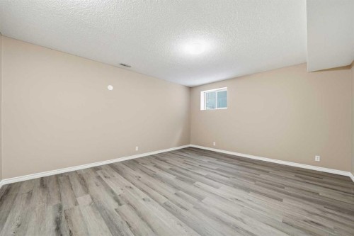 1076 Cranston Drive Se, Calgary, AB - Indoor Photo Showing Other Room