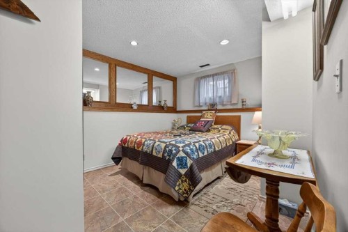 382 Ellis Crescent Se, High River, AB - Indoor Photo Showing Bedroom
