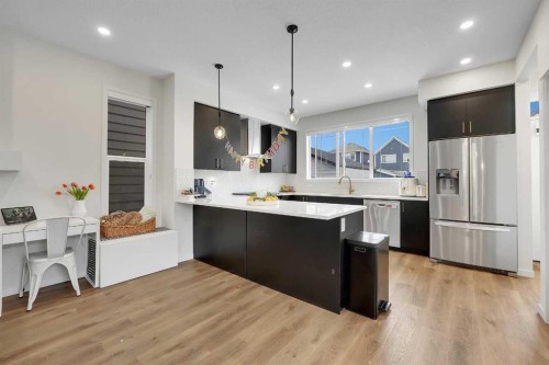 84 Magnolia Common Se, Calgary, AB - Indoor Photo Showing Kitchen With Upgraded Kitchen