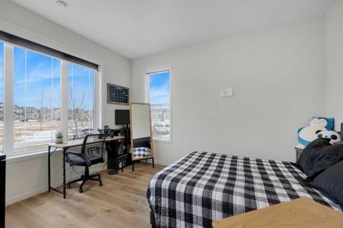 84 Magnolia Common Se, Calgary, AB - Indoor Photo Showing Bedroom