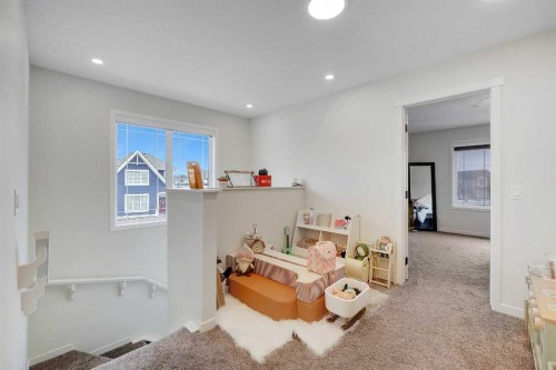 84 Magnolia Common Se, Calgary, AB - Indoor Photo Showing Other Room