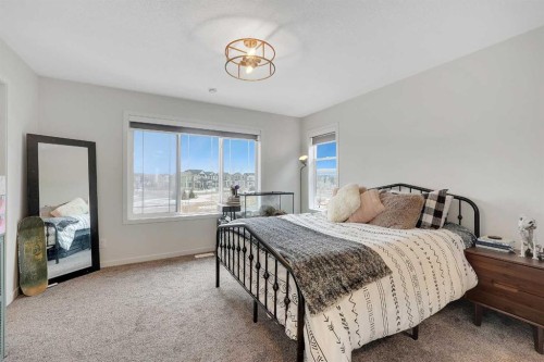 84 Magnolia Common Se, Calgary, AB - Indoor Photo Showing Bedroom