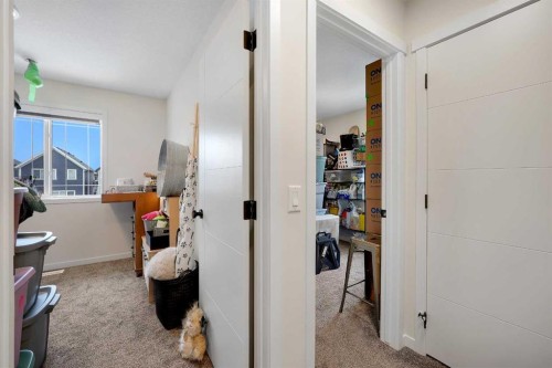 84 Magnolia Common Se, Calgary, AB - Indoor Photo Showing Other Room