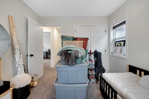 84 Magnolia Common Se, Calgary, AB - Indoor Photo Showing Bedroom