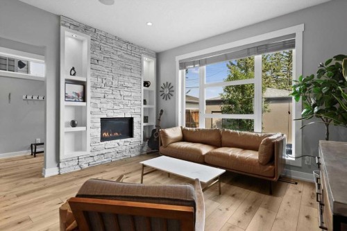 2316 22 Street Nw, Calgary, AB - Indoor Photo Showing Living Room With Fireplace