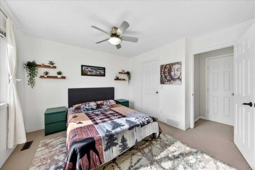 99 Copperfield Court Se, Calgary, AB - Indoor Photo Showing Bedroom