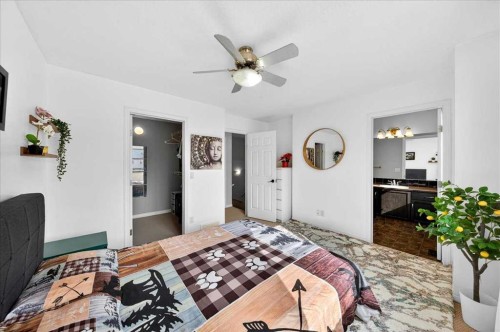 99 Copperfield Court Se, Calgary, AB - Indoor Photo Showing Bedroom
