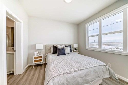 142 Sora Gardens Se, Calgary, AB - Indoor Photo Showing Bedroom