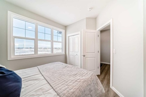 142 Sora Gardens Se, Calgary, AB - Indoor Photo Showing Bedroom