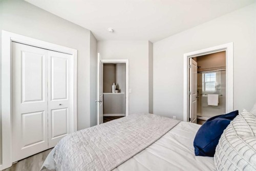 142 Sora Gardens Se, Calgary, AB - Indoor Photo Showing Bedroom