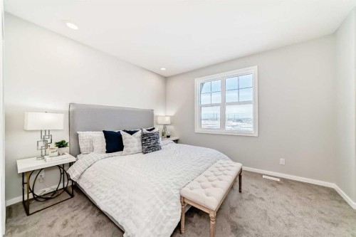 142 Sora Gardens Se, Calgary, AB - Indoor Photo Showing Bedroom