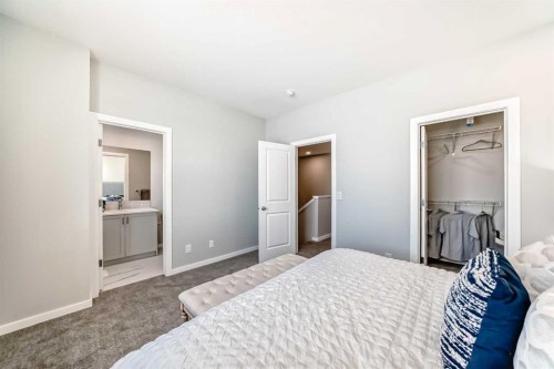 142 Sora Gardens Se, Calgary, AB - Indoor Photo Showing Bedroom