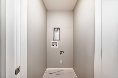 142 Sora Gardens Se, Calgary, AB - Indoor Photo Showing Other Room
