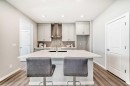 142 Sora Gardens Se, Calgary, AB  - Indoor Photo Showing Kitchen With Upgraded Kitchen 