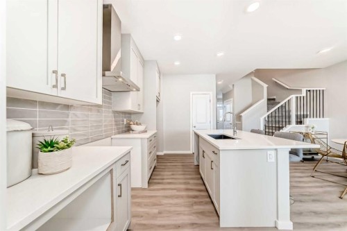 142 Sora Gardens Se, Calgary, AB - Indoor Photo Showing Kitchen With Upgraded Kitchen