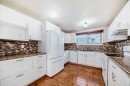 72 Whitehaven Road Ne, Calgary, AB  - Indoor Photo Showing Kitchen With Double Sink 