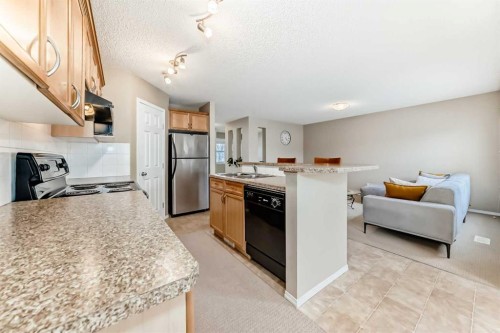 136 Everglen Road Sw, Calgary, AB - Indoor Photo Showing Kitchen With Double Sink