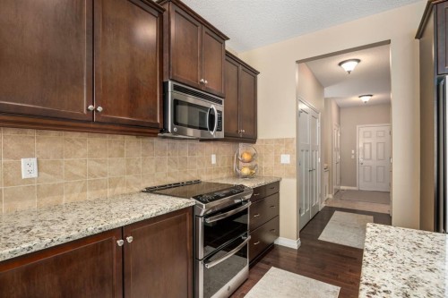 596 Everbrook Way Sw, Calgary, AB - Indoor Photo Showing Kitchen With Upgraded Kitchen