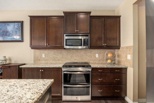 596 Everbrook Way Sw, Calgary, AB - Indoor Photo Showing Kitchen With Upgraded Kitchen