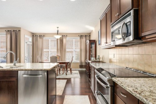 596 Everbrook Way Sw, Calgary, AB - Indoor Photo Showing Kitchen With Upgraded Kitchen