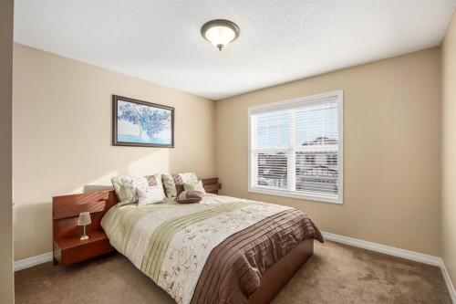 596 Everbrook Way Sw, Calgary, AB - Indoor Photo Showing Bedroom