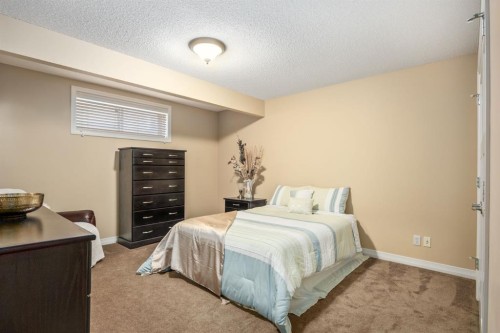 596 Everbrook Way Sw, Calgary, AB - Indoor Photo Showing Bedroom