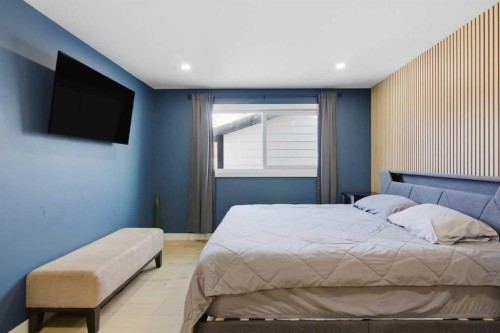 428 Queen Anne Way Se, Calgary, AB - Indoor Photo Showing Bedroom