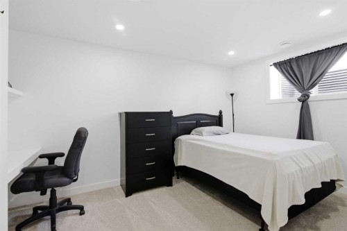 428 Queen Anne Way Se, Calgary, AB - Indoor Photo Showing Bedroom