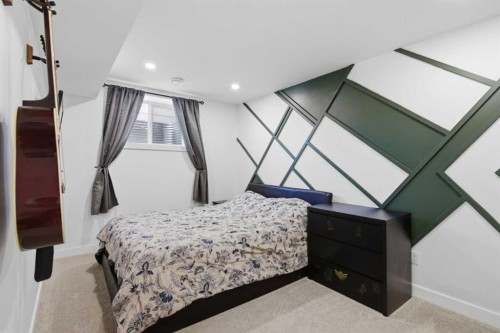 428 Queen Anne Way Se, Calgary, AB - Indoor Photo Showing Bedroom