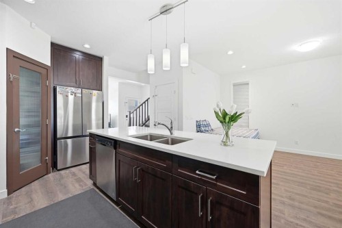 15 Corner Meadows Common Ne, Calgary, AB - Indoor Photo Showing Kitchen With Double Sink With Upgraded Kitchen