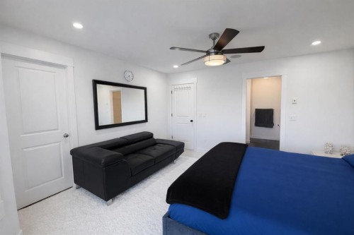 292 Rainbow Falls Drive, Chestermere, AB - Indoor Photo Showing Bedroom